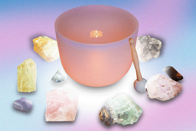 A song bowl surrounded by crystals used for energy healing